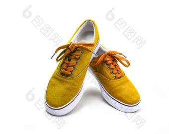 一对黄色的颜色<strong>帆布鞋</strong>子孤立的白色背景与剪裁路径一对黄色的颜色<strong>帆布鞋</strong>子孤立的白色