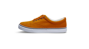 橙色帆布鞋子孤立的白色背景与剪裁路径橙色帆布鞋子孤立的白色背景