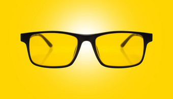 单<strong>太阳</strong>镜与黑色的塑料框架和<strong>黄色</strong>的玻璃Yelow背景单<strong>太阳</strong>镜与黑色的塑料框架和<strong>黄色</strong>的玻璃