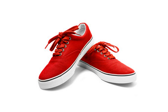 一对红色的帆布鞋子孤立的白色背景与剪裁路径一对绿色帆布鞋子孤立的白色