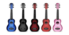尤克里里琴吉他不同的颜色蓝色的黑色的黑暗红色的粉红色的孤立的特写镜头白色背景