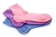 蓝色的淡紫色而且粉红色的袜子白色背景