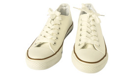 白色美丽的运动鞋时尚鞋为女人孤立的在白色与剪裁路径