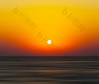 水平生动的橙色日落海洋地平线抽象模糊背景背景水平生动的橙色日落海洋地平线抽象模糊