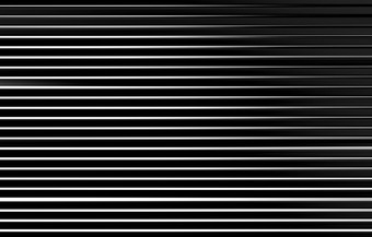 水平黑色的和白色运动模糊面板背景水平黑色的和白色运动模糊面板背景