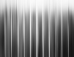 垂直黑色的和白色运动模糊窗帘背景垂直黑色的和白色运动模糊窗帘背景