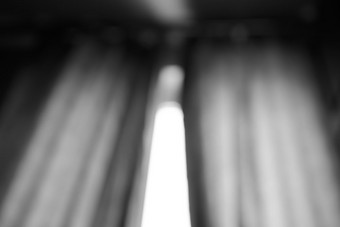 黑色的和白色窗口窗帘散景背景黑色的和白色窗口窗帘散景背景