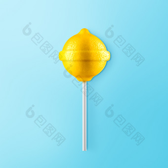 棒棒糖柠檬孤立的蓝色的背景有创意的糖果的想法棒棒糖柠檬