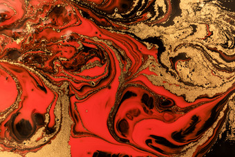 黄金大理石<strong>花纹</strong>纹理设计红色的和金大理石模式流体艺术黄金大理石<strong>花纹</strong>纹理设计红色的和金大理石模式流体艺术