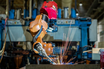 橙色工业机器人焊接assemblycar部分工厂