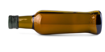 的说谎的一边棕色（的）瓶与橄榄石油白色说谎的一边绿色瓶与橄榄石油白色