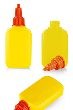黄色的管胶水孤立的白色背景的黄色的管胶水孤立的白色背景
