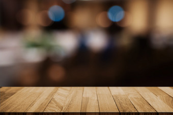 木桌面前面<strong>蒙太奇</strong>模糊餐厅咖啡馆厨房背景