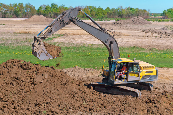 的挖掘机挖掘的地面的挖掘机作品桶土方机械的情况下的挖掘机作品桶土方机械的情况下的挖掘机挖掘的地面