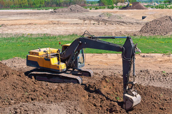 的挖掘机挖掘的地面的挖掘机作品桶土方机械的情况下的挖掘机作品桶土方机械的情况下的挖掘机挖掘的地面