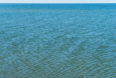 背景涟漪蓝色的水海表面海表面背景涟漪蓝色的水