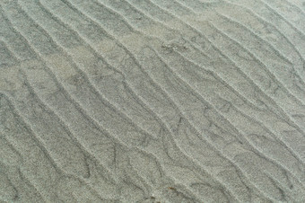 沙子涟漪波浪沙子表面桑迪光滑的海海岸波浪沙子表面桑迪光滑的海海岸沙子涟漪