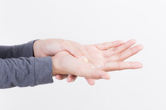 女人手疼痛白色背景健康和疾病概念