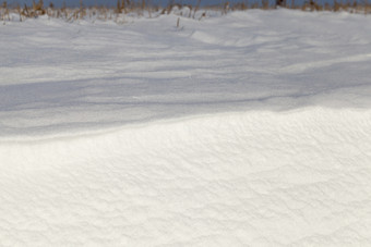 结构<strong>雪地</strong>里阳光明媚的冬天一天特写镜头自然结构<strong>雪地</strong>里