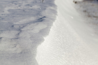 结构<strong>雪地</strong>里阳光明媚的冬天一天特写镜头自然结构<strong>雪地</strong>里