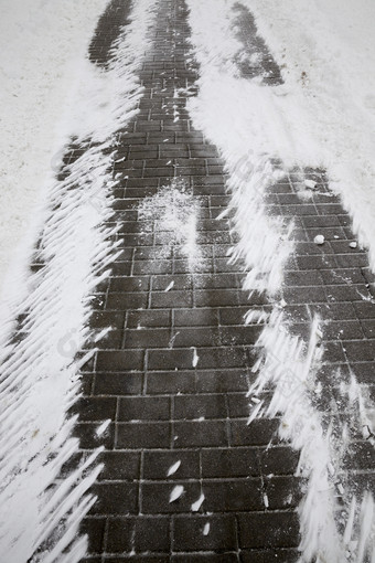 部分的行人路从的瓷砖那的冬天季节很差的清洗雪特写镜头基础<strong>设施</strong>的城市基础<strong>设施</strong>的城市