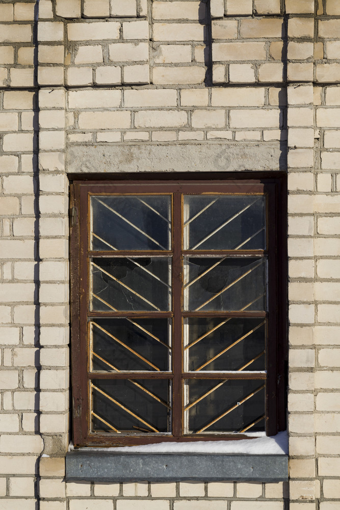 照片老木晶格窗口老砖建筑晶格窗口