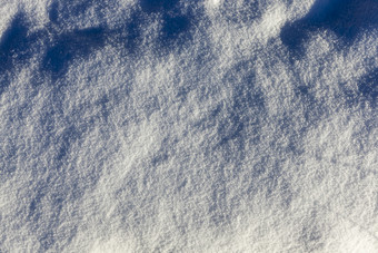 层雪后降雪表面<strong>违规</strong>行为是可见照片采取特写镜头与小深度场冬天季节疙瘩的雪冬天