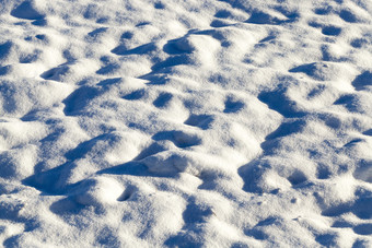 层雪后降雪表面<strong>违规</strong>行为是可见照片采取特写镜头与小深度场冬天季节疙瘩的雪冬天