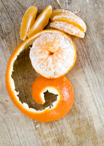 去皮成熟的橙色普通话普通话皮谎言的形式螺旋特写镜头柑橘类去皮成熟的橙色普通话