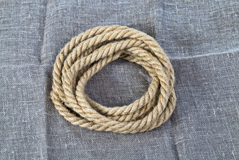 黑暗灰色的绳子使亚麻材料亚麻桌布关闭绳子黑暗灰色的绳子