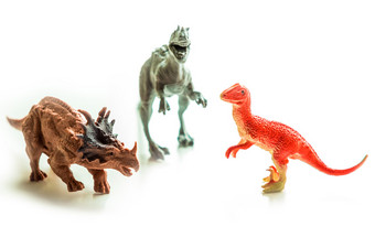 恐龙玩具白色孤立的背景小大小的恐龙玩具白色孤立的背景