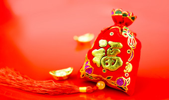 中国人新一年装饰红色的感觉织物包这<strong>战俘</strong>与词繁荣的和金锭红色的织物