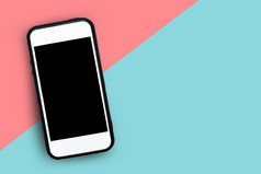 智能手机粉红色的背景和聪明的技术概念