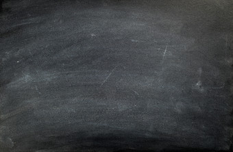 黑板上黑板纹理空空白黑色的黑板与粉笔痕迹