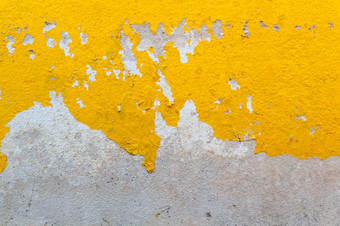 摘要色彩斑斓的水泥墙纹理和背景混凝土表面的黄色的染色破碎的高质量图片使用为设计和的背景