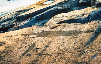 吸引力卡累利阿共和国奥涅加岩画史前岩石雕刻th-nd几千年雕刻的花岗岩海岸的湖的角besov我们的的著名的符号水獭和天鹅水獭和天鹅符号奥涅加岩画的角besov