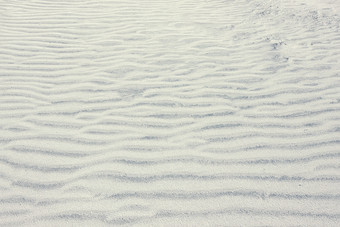 白色沙子沙丘的表面的海滩石英沙子白色沙丘石英沙子特写镜头