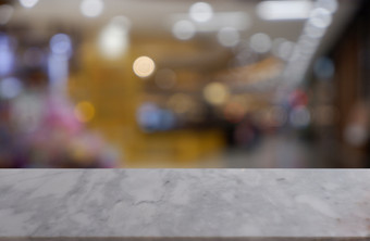空白色大理石石头表格前面摘要模糊背景购物购物中心咖啡馆和咖啡商店室内可以使用为显示蒙太奇你的<strong>产品图</strong>像