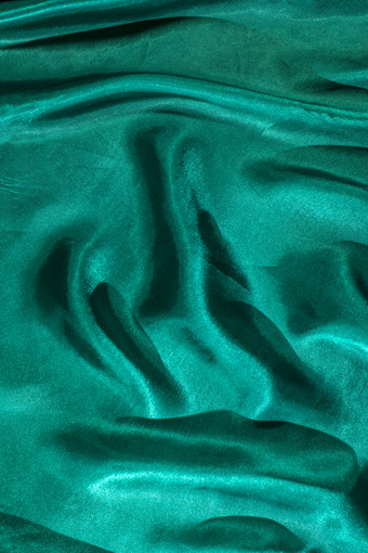 背景绿色缎织物<strong>闪亮</strong>的呈绿色的丝绸背景