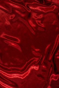 背景红色的缎织物闪亮的丝绸背景