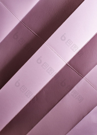 折叠粉红色的颜色纸柔和的音调硬自然光折叠和皱纹纸几何形状和数据的纸