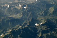 视图日落从内部的飞机通过的窗口西班牙语庇里牛斯山