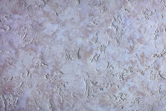 美丽的纹理图片威尼斯石膏类似的的紫色的空气花岗岩的墙的纹理的威尼斯石膏就像紫色的花岗岩的墙