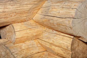 的角落里联合的墙木房子去皮从的树皮的日志特写镜头明显纹理木与纵向和横向裂缝清晰度日志没有树皮的形状角当建筑日志小屋