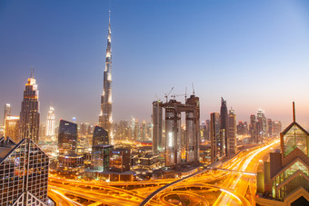 迪拜<strong>阿联酋</strong>2月迪拜塔哈利法塔的最高的建筑的世界迪拜市中心城市景观迪拜晚上天际线忙谢赫。扎耶德路十字路口日落2月迪拜