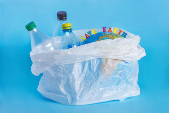 登记保存地球塑料瓶摘要地球聚乙烯袋蓝色的背景概念生态问题环境污染地球塑料地球一天世界环境一天