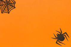 万圣节背景黑色的纸猫头鹰橙色背景快乐万圣节概念空间为文本前视图模型布局平躺万圣节背景黑色的纸猫头鹰黑色的框架橙色背景
