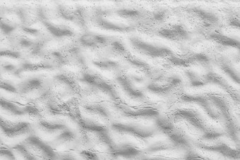 白色装饰彩色的表面无缝的纹理背景与波浪不规则的模式