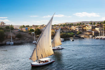 帆船的水域河尼罗河阿斯旺日落埃及帆船尼罗河阿斯旺