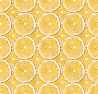 新鲜的黄色的柠檬片无缝的模式关闭柑橘类水果背景<strong>工作室摄影</strong>背景新鲜的黄色的柠檬片无缝的模式关闭<strong>工作室摄影</strong>